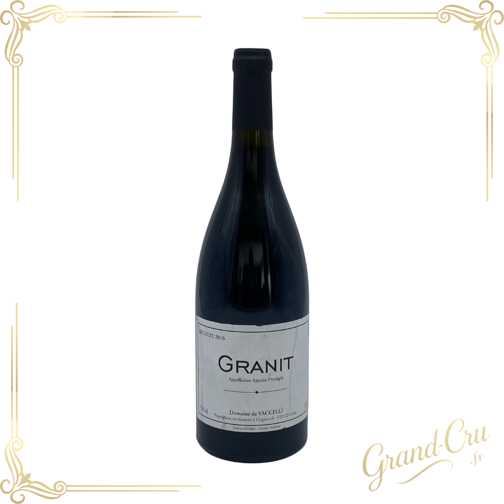Bouteille de vin rouge Granit 2016 du Domaine Vaccelli, appellation Ajaccio, Corse, présentée élégamment avec sa robe grenat profonde.